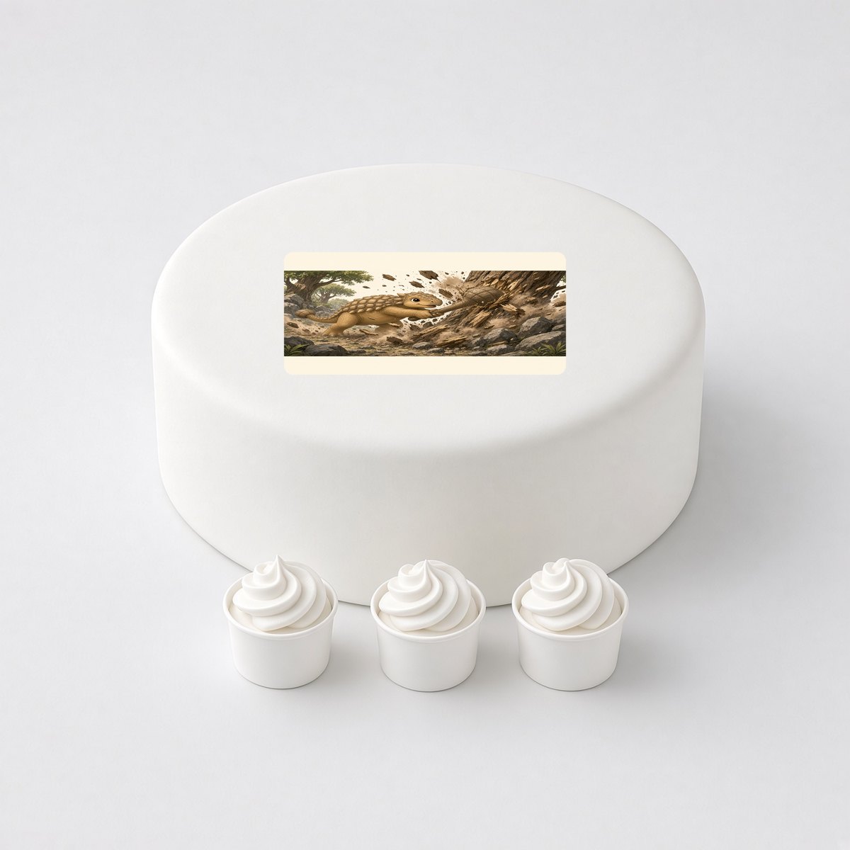 Ankylosaurus in a cartoon scene, printed on a square cake topper on a white cake, with the words your text here above and below.