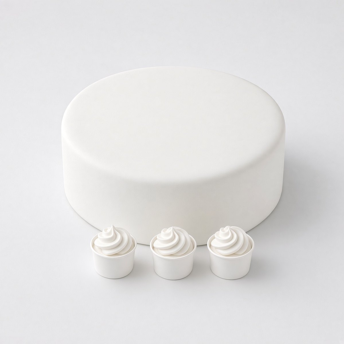 White cake with small cupcakes in front, the Aberdeen badge in the middle, and the words your text here curved above and below the badge.